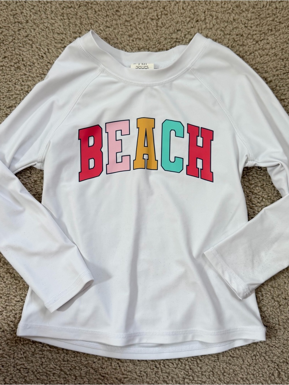 Feather for arrow girls size 6 rash guard BEACH